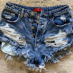 Ripped denim shorts